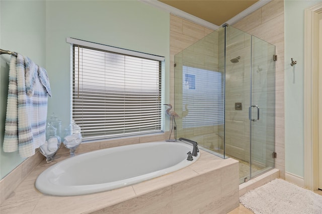 11310 Stonecreek Bend Ln, Cypress, TX 77433 - full bath with a stall shower, a garden tub, and ornamental molding