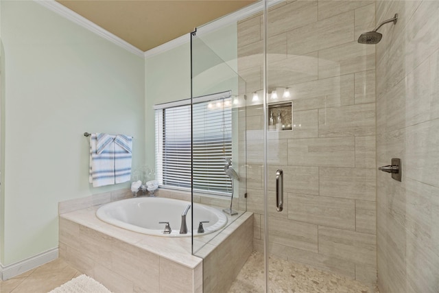 11310 Stonecreek Bend Ln, Cypress, TX 77433 - bathroom with tile patterned floors, crown molding, a garden tub, and a shower stall