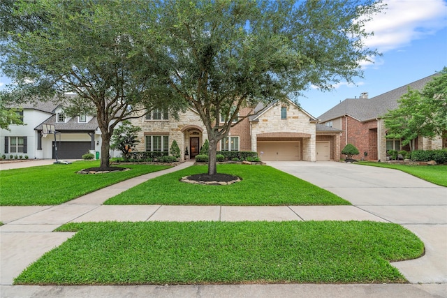 11310 Stonecreek Bend Ln, Cypress, TX 77433 - view of front of property with stone siding, driveway, a front yard, and a garage