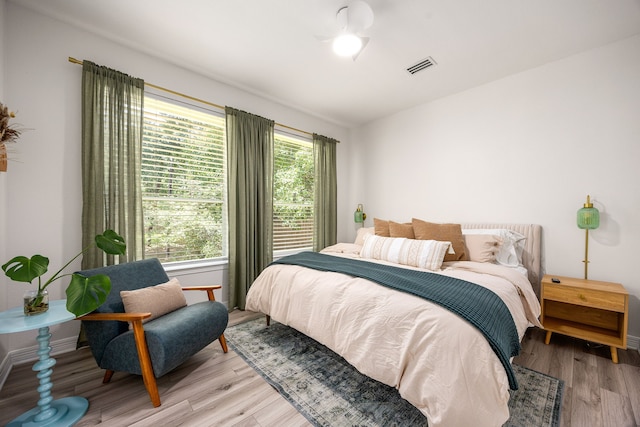 14742 Timbergreen Dr, Magnolia, TX 77355 - bedroom with light wood-style floors and baseboards