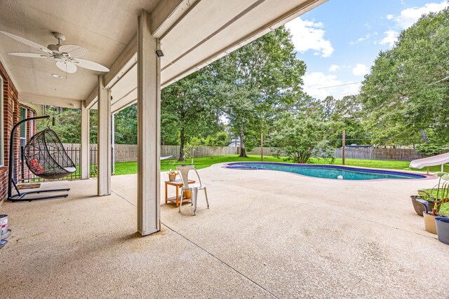 14742 Timbergreen Dr, Magnolia, TX 77355 - view of pool featuring a water slide, a ceiling fan, and a patio