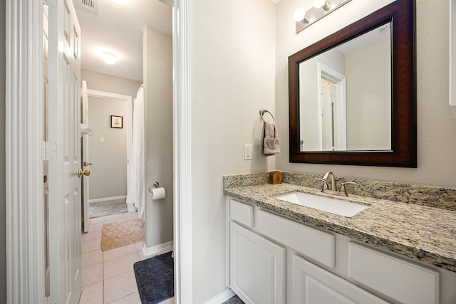 14742 Timbergreen Dr, Magnolia, TX 77355 - bathroom with vanity, tile patterned floors, baseboards, and a shower with curtain