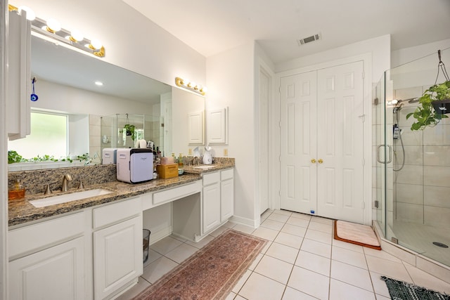14742 Timbergreen Dr, Magnolia, TX 77355 - full bath with a shower stall, tile patterned flooring, and double vanity