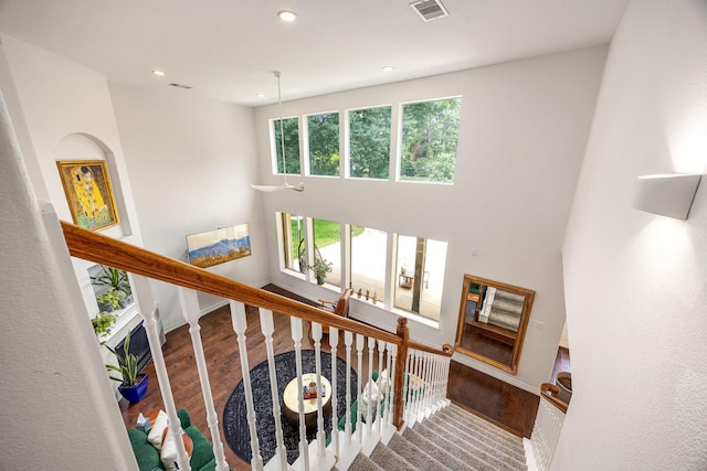 14742 Timbergreen Dr, Magnolia, TX 77355 - staircase featuring wood finished floors, recessed lighting, and baseboards