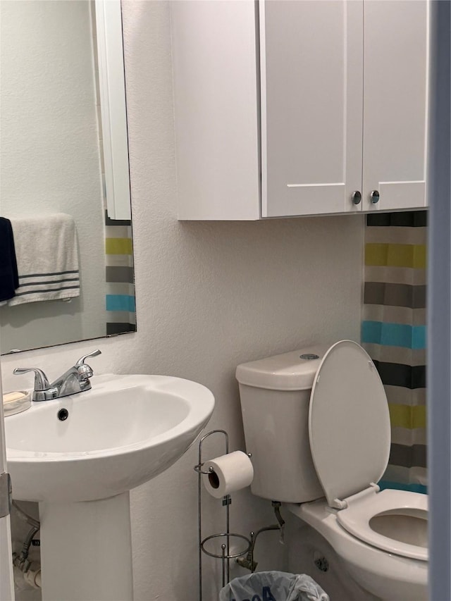 3876 Hummingbird, Bedias, TX 77831 - bathroom featuring toilet