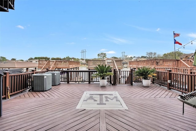 253 Capetown, Montgomery, TX 77356 - wooden deck featuring central AC