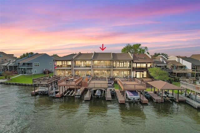 253 Capetown, Montgomery, TX 77356 - dock area featuring boat lift, a balcony, a residential view, and a water view