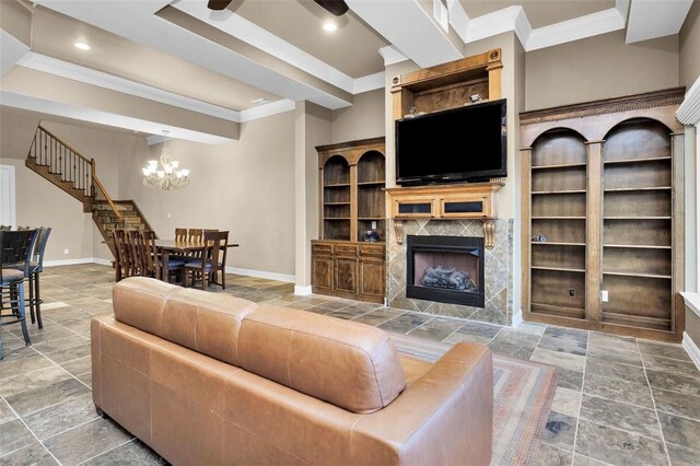 253 Capetown, Montgomery, TX 77356 - living room featuring ornamental molding, baseboards, a chandelier, a premium fireplace, and recessed lighting