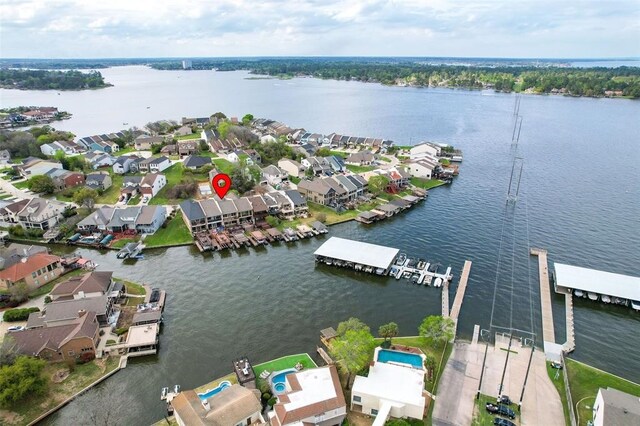 253 Capetown, Montgomery, TX 77356 - aerial view of property's location with a nearby body of water and nearby suburban area