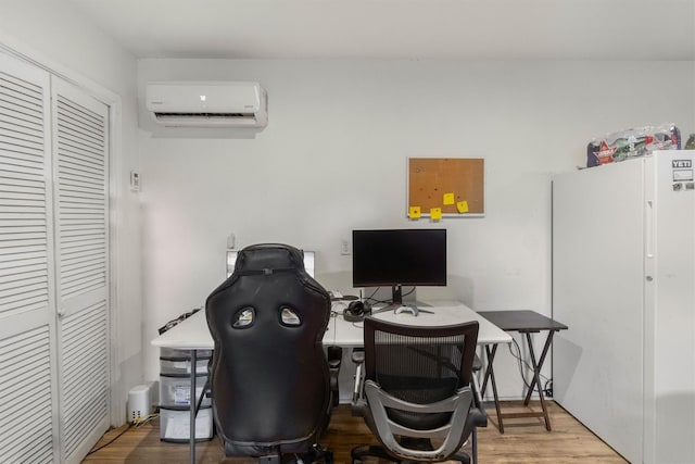 3824 Tower Rd, Santa Fe, TX 77517 - home office featuring a wall mounted air conditioner and wood finished floors