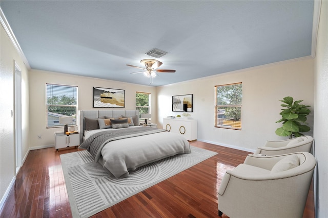 20151 Pioneer Ridge Dr, Cypress, TX 77433 - bedroom featuring ornamental molding, multiple windows, dark wood-style floors, baseboards, and a ceiling fan