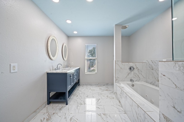 20151 Pioneer Ridge Dr, Cypress, TX 77433 - bathroom with marble finish floors, a jetted tub, vanity, recessed lighting, and baseboards