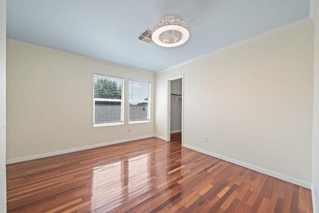 20151 Pioneer Ridge Dr, Cypress, TX 77433 - spare room with ornamental molding, wood finished floors, and baseboards