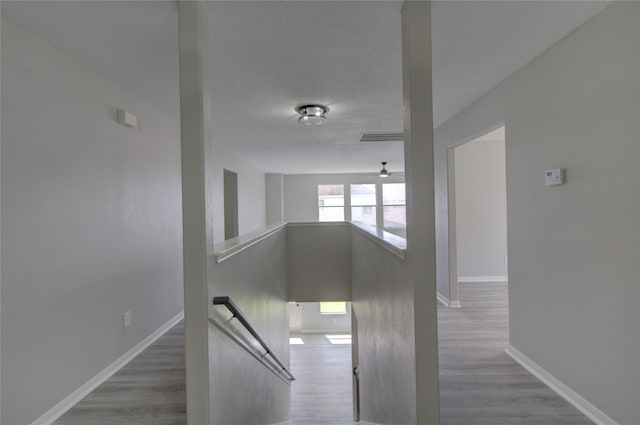 11623 Silent Elm St, Houston, TX 77044 - stairway with baseboards and wood finished floors