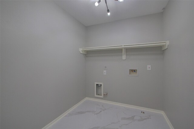 11623 Silent Elm St, Houston, TX 77044 - laundry area with hookup for a gas dryer, hookup for a washing machine, hookup for an electric dryer, baseboards, and marble finish flooring