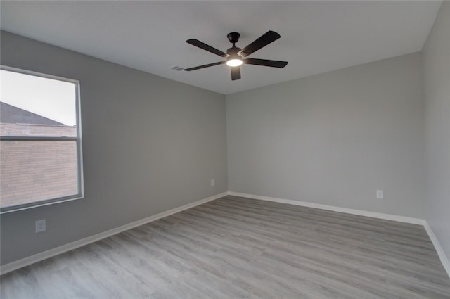 11623 Silent Elm St, Houston, TX 77044 - unfurnished room featuring wood finished floors, ceiling fan, and baseboards