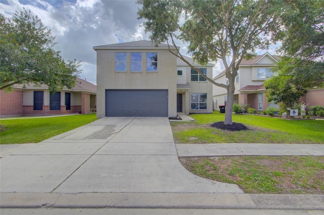 11623 Silent Elm St, Houston, TX 77044 - traditional home with a garage, brick siding, driveway, and a front yard