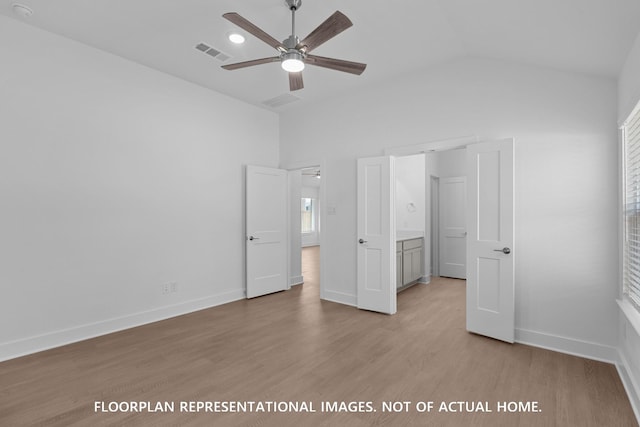 20526 Draper Rd, Tomball, TX 77377 - unfurnished bedroom featuring light wood-style floors, lofted ceiling, and baseboards