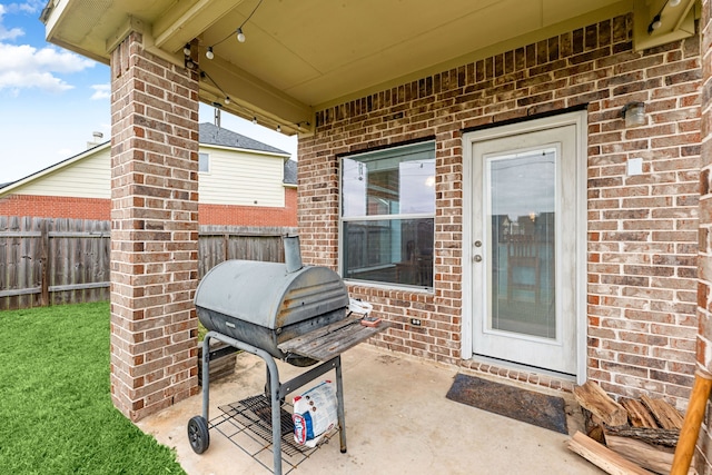 9619 Whittington Park Ln, Houston, TX 77095 - view of patio featuring fence and area for grilling