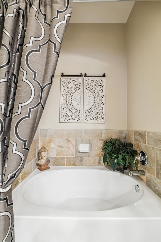 full bathroom featuring a bath