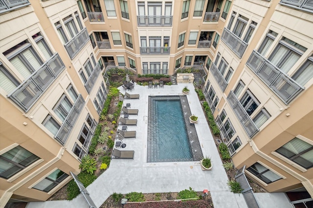 community pool with a patio area