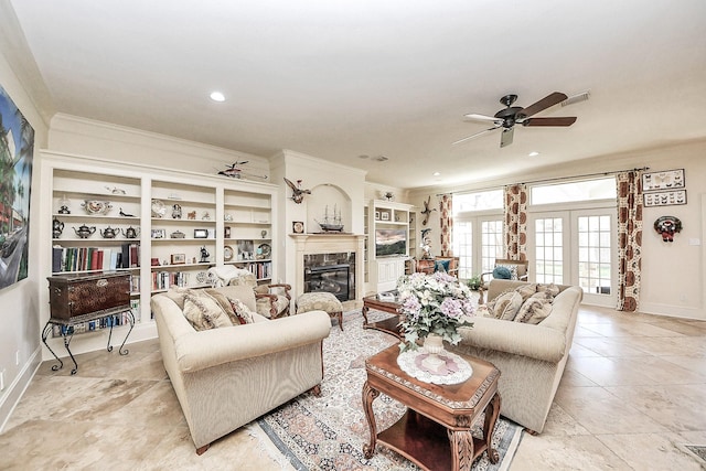 5701 Sugar Hill Dr, Houston, TX 77057 - living room featuring a ceiling fan, ornamental molding, a glass covered fireplace, baseboards, and french doors