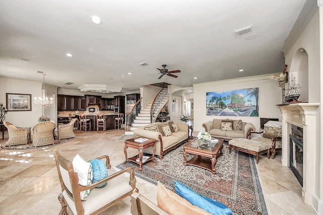 5701 Sugar Hill Dr, Houston, TX 77057 - living area featuring crown molding, a fireplace, stairway, a ceiling fan, and recessed lighting