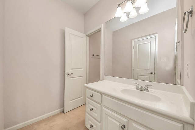 5701 Sugar Hill Dr, Houston, TX 77057 - bathroom featuring vanity and baseboards