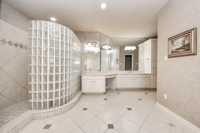 5701 Sugar Hill Dr, Houston, TX 77057 - full bathroom featuring a walk in shower, tile patterned flooring, vanity, and recessed lighting