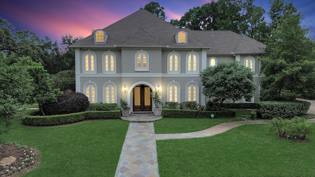 5701 Sugar Hill Dr, Houston, TX 77057 - french provincial home with stucco siding, a yard, roof with shingles, and french doors