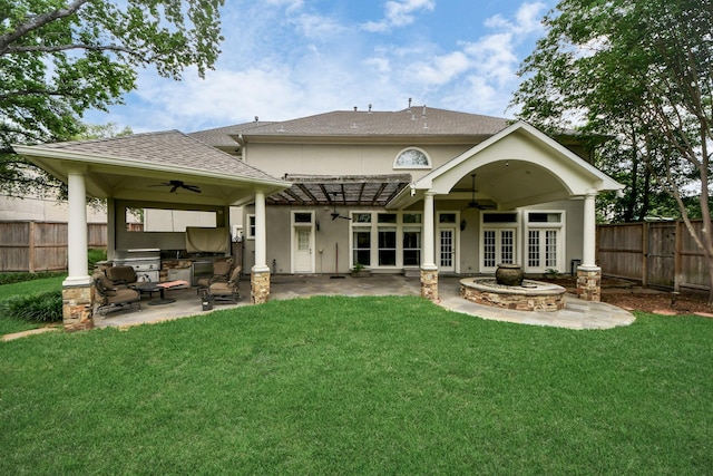 5701 Sugar Hill Dr, Houston, TX 77057 - back of house featuring a ceiling fan, french doors, an outdoor kitchen, a shingled roof, and a patio area
