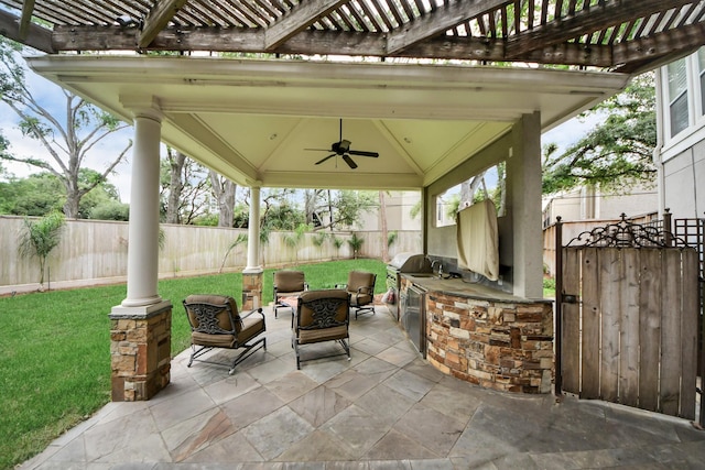5701 Sugar Hill Dr, Houston, TX 77057 - view of patio / terrace with an outdoor kitchen, a pergola, a ceiling fan, and a fire pit