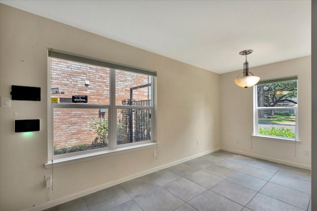 411 Westmoreland St Unit 1, Houston, TX 77006 - unfurnished room with baseboards and tile patterned flooring
