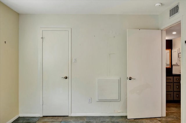 411 Westmoreland St Unit 1, Houston, TX 77006 - unfurnished bedroom featuring baseboards