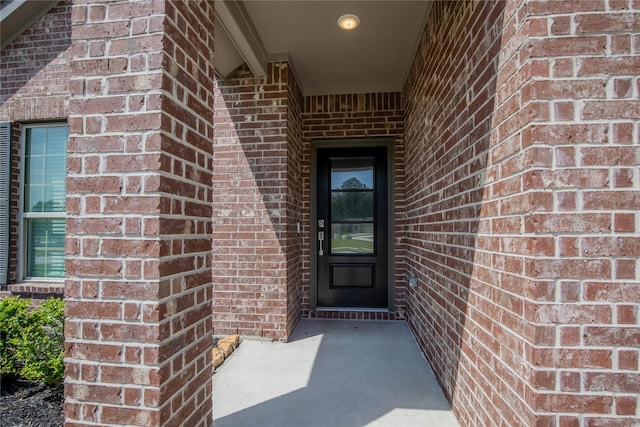 22065 Juniper Crossing Dr, New Caney, TX 77357 - property entrance featuring brick siding