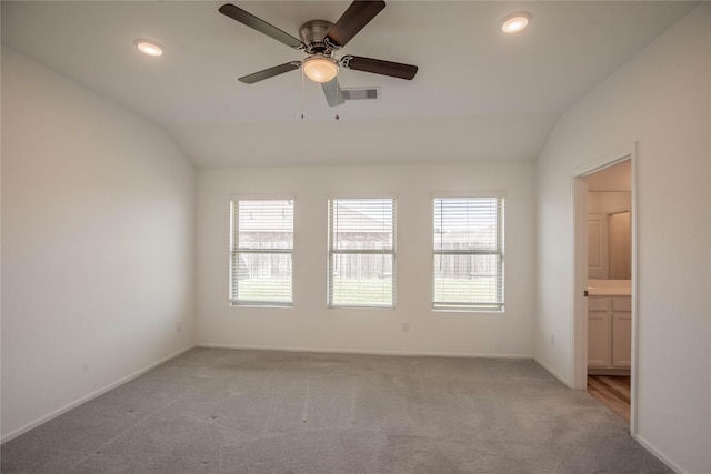 22065 Juniper Crossing Dr, New Caney, TX 77357 - unfurnished room with lofted ceiling, carpet floors, ceiling fan, baseboards, and recessed lighting