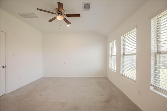 22065 Juniper Crossing Dr, New Caney, TX 77357 - spare room with healthy amount of natural light, carpet flooring, a ceiling fan, lofted ceiling, and recessed lighting