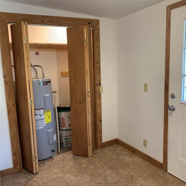 324 Persimmon Rd, Onalaska, TX 77360 - utility room featuring water heater