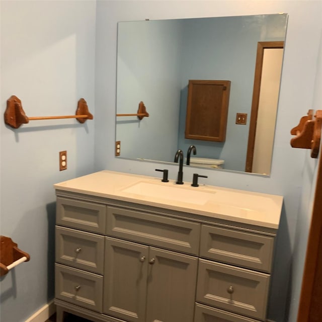 324 Persimmon Rd, Onalaska, TX 77360 - bathroom featuring vanity and toilet