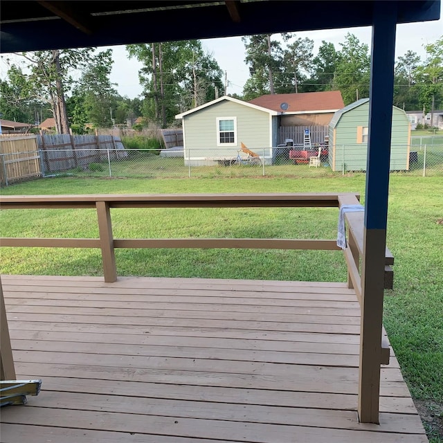 324 Persimmon Rd, Onalaska, TX 77360 - wooden terrace with a shed and an outdoor structure