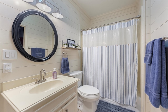 711 Valley Commons Dr, Huffman, TX 77336 - bathroom with vanity, toilet, ornamental molding, wooden walls, and shower / tub combo
