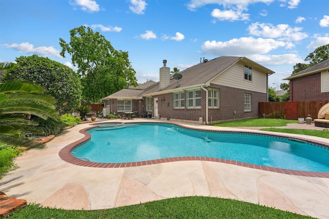 17150 Mountain Crest Dr, Spring, TX 77379 - view of swimming pool with a patio area, a fenced backyard, and a pool with connected hot tub