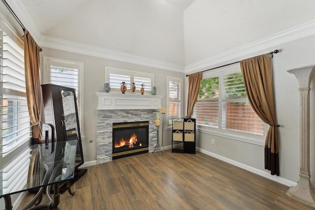 17150 Mountain Crest Dr, Spring, TX 77379 - living area with a fireplace, dark wood finished floors, healthy amount of natural light, baseboards, and lofted ceiling