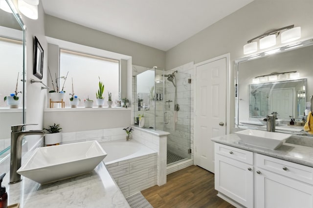 17150 Mountain Crest Dr, Spring, TX 77379 - full bath featuring a stall shower, a bath, vanity, and wood finished floors
