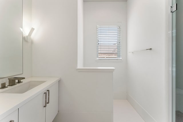 3214 W Benders Landing Blvd, Spring, TX 77386 - bathroom featuring vanity and baseboards