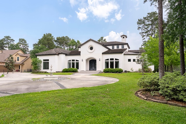 3214 W Benders Landing Blvd, Spring, TX 77386 - view of front of home with stucco siding and a front lawn