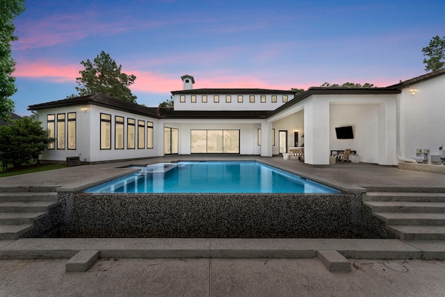3214 W Benders Landing Blvd, Spring, TX 77386 - back of house featuring stucco siding, an outdoor pool, and a patio