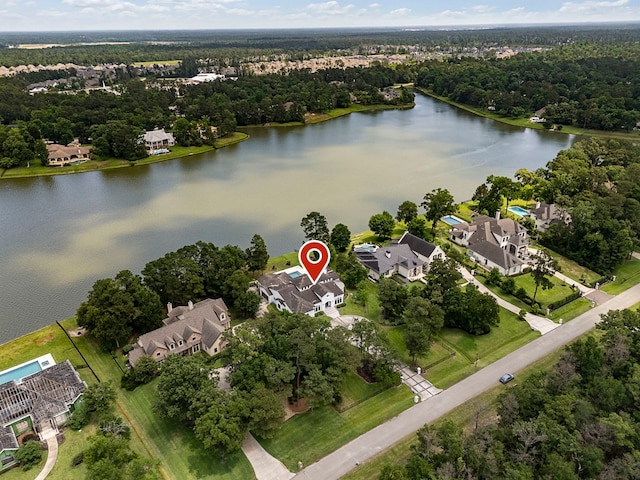 3214 W Benders Landing Blvd, Spring, TX 77386 - aerial view of residential area featuring a nearby body of water and a heavily wooded area