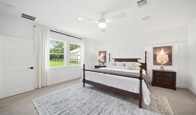 106 Kickapoo Dr, Anahuac, TX 77514 - bedroom featuring carpet flooring and ceiling fan