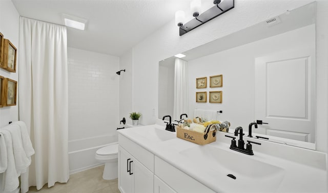 106 Kickapoo Dr, Anahuac, TX 77514 - full bath with double vanity, shower / tub combo with curtain, and tile patterned floors